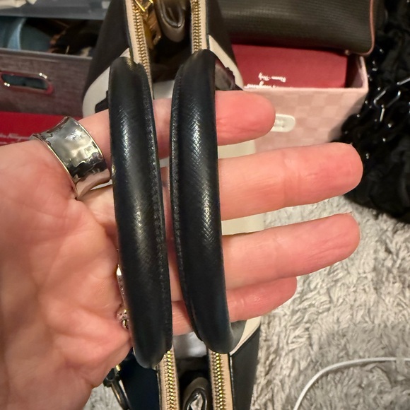 Prada Black and Cream Satchel
Saffiano Leather
Beautiful Handbag - Picture 3 of 12